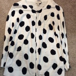 White cardigan with black polka dots